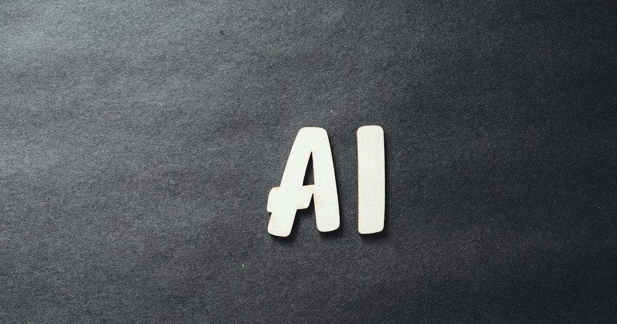 AI letters on a dark surface